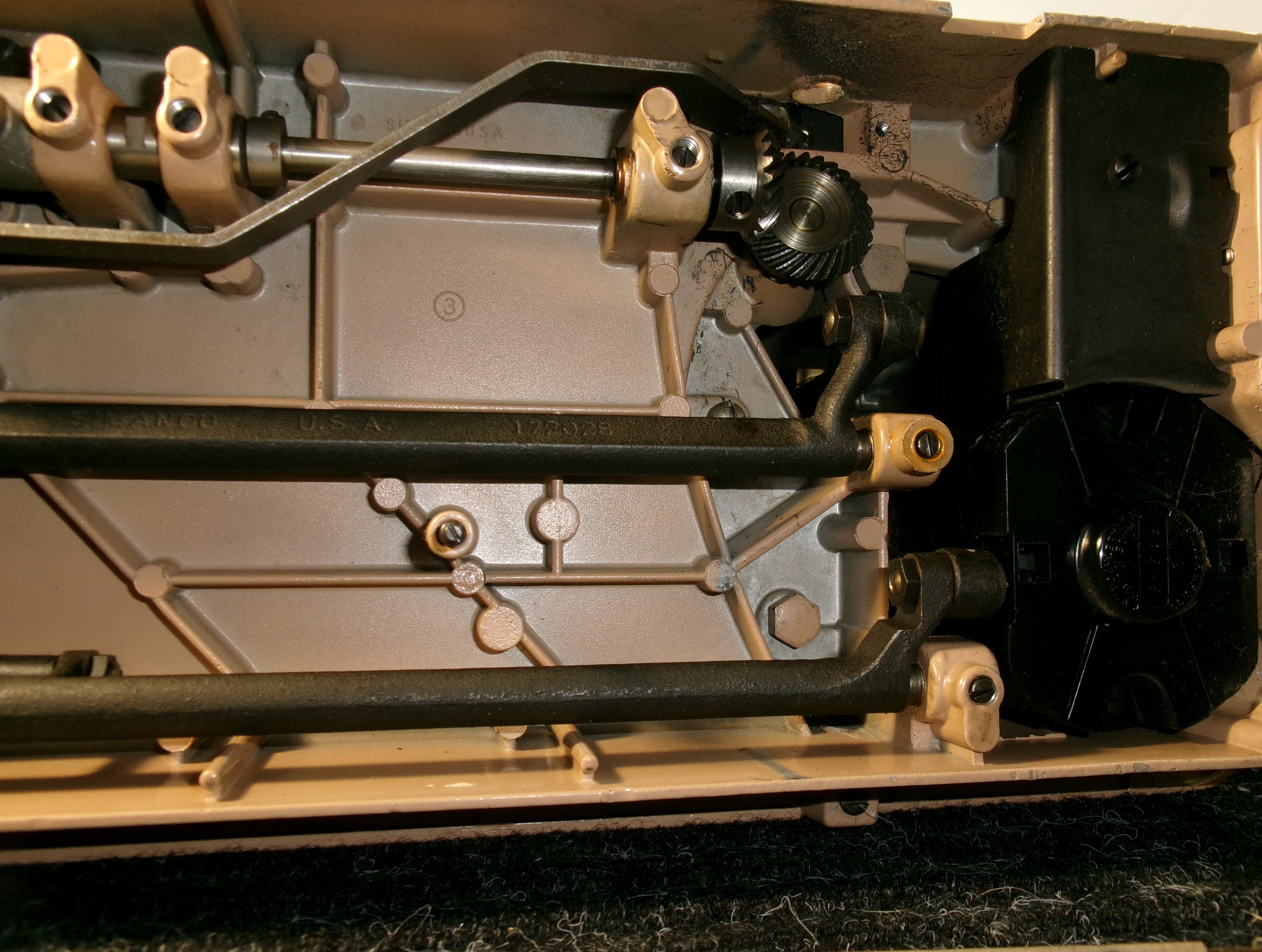 Bottom side of sewing machine