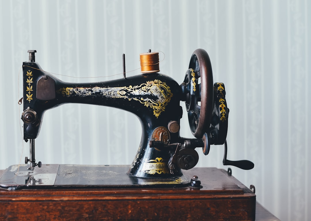 Vintage Singer sewing machine with the Singer decal scratched